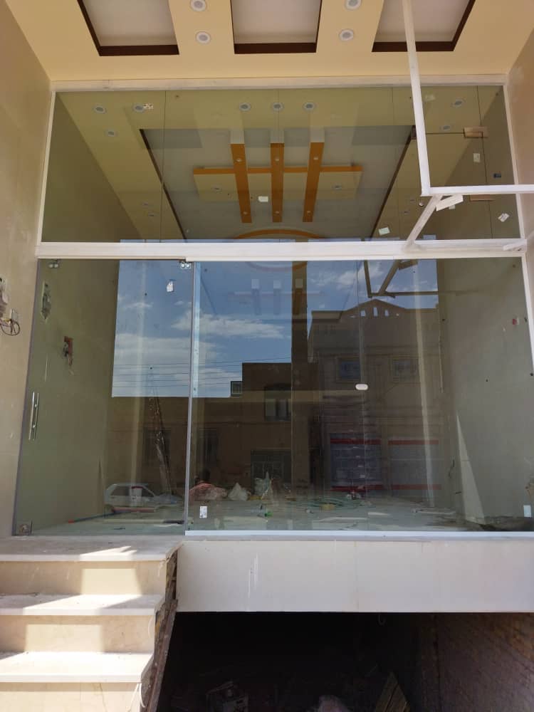 طراحی ونصب شیشه سکوریت دستی